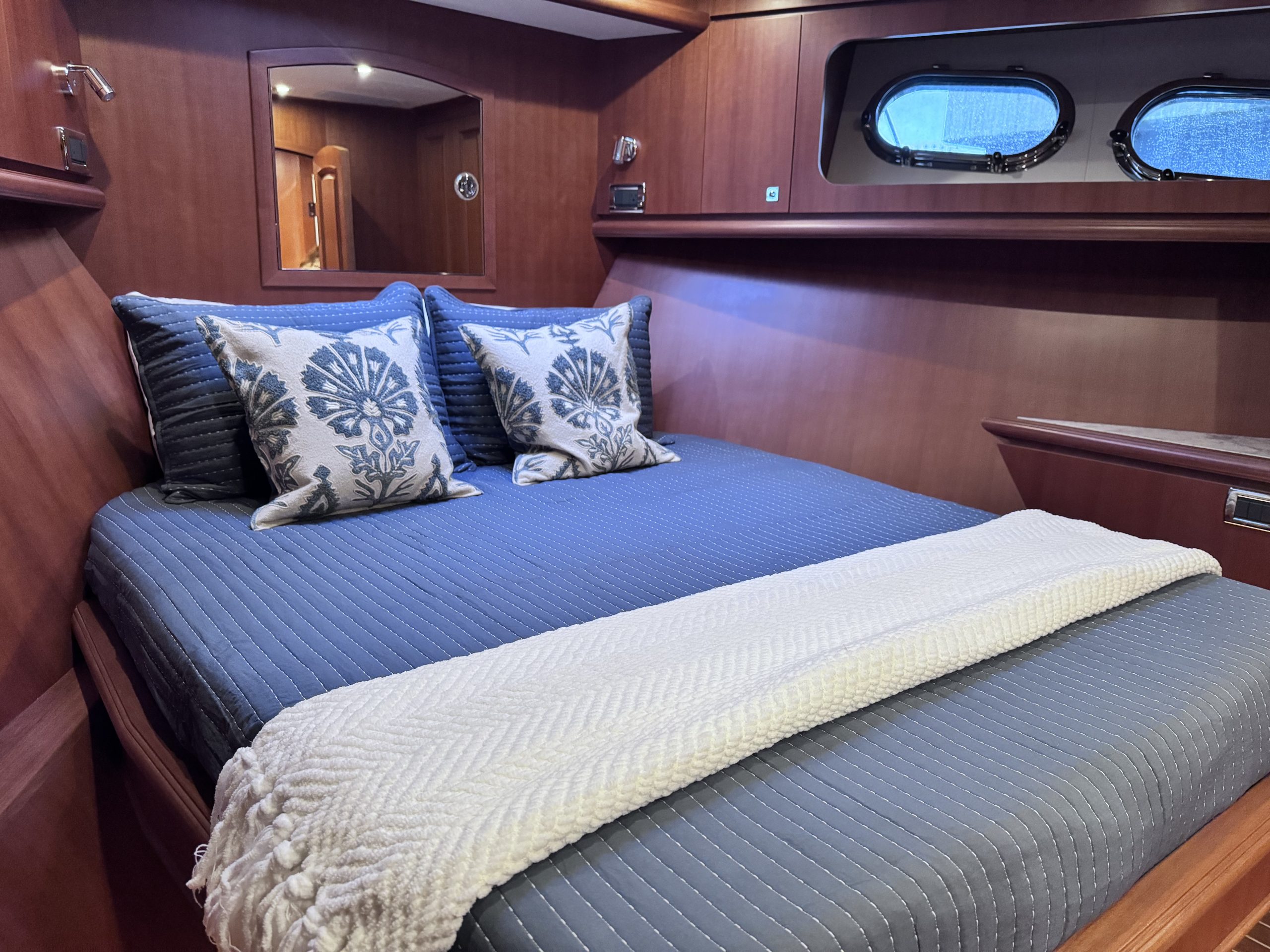 Northwest 55 VIP Guest stateroom cabin with queen bed.